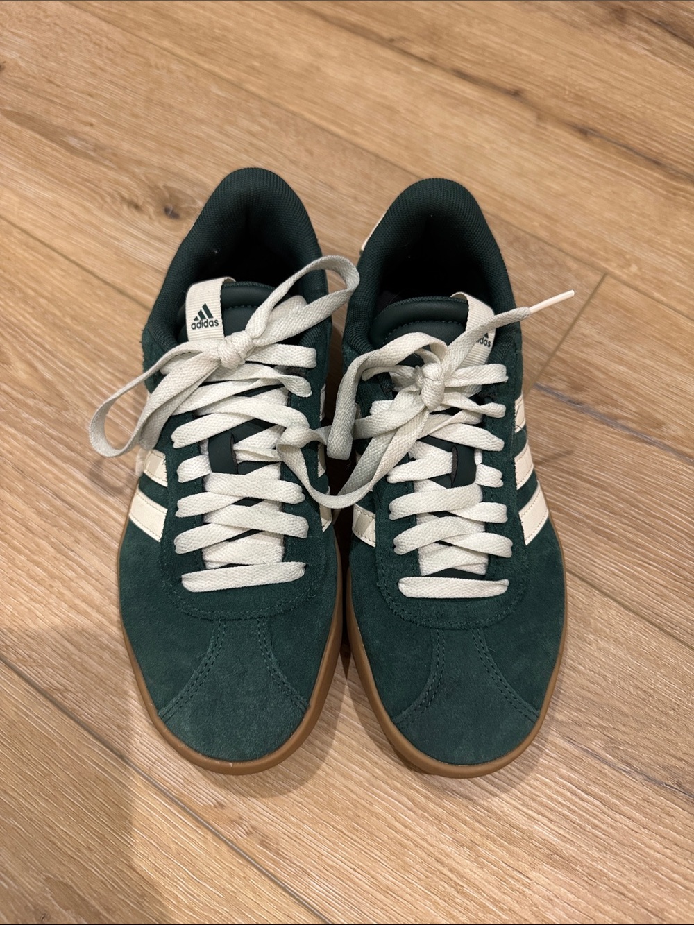adidas womans Dark Green Suede Sneakers with White Stripes